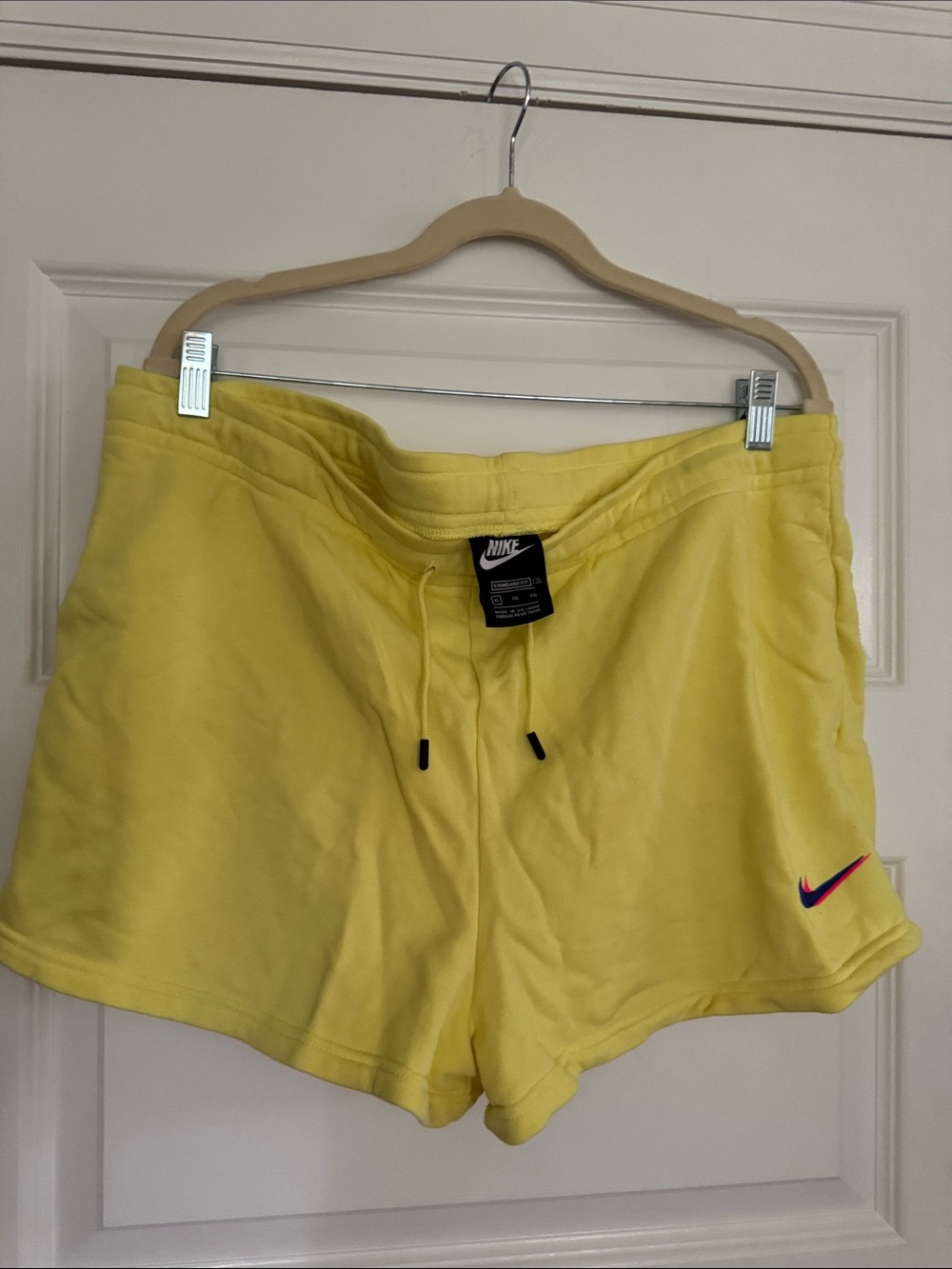 Nike Women’s Bright Yellow Athletic Shorts with Pink Swoosh. XL. New w/o tags